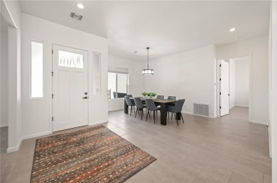 3259 Esmerelda Drive is a single-family residence that presents on Laughlin Ranch Golf Club in Arizona - for sale on GolfHomes.com, golf home, golf lot