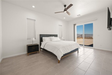 3259 Esmerelda Drive is a single-family residence that presents on Laughlin Ranch Golf Club in Arizona - for sale on GolfHomes.com, golf home, golf lot