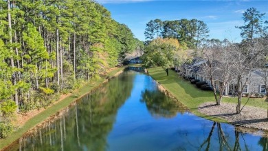 Enjoy low-maintenance living in this charming 2BD/2BA+Den villa on Okatie Creek Golf Club in South Carolina - for sale on GolfHomes.com, golf home, golf lot