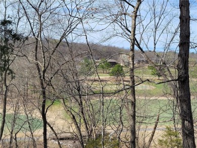 This lot adjoins two other lots on Scalloway that are listed by on Bella Vista Country Club - Scottsdale in Arkansas - for sale on GolfHomes.com, golf home, golf lot