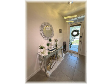 SE - DIRECTLY ON THE GOLF COURSE - WITH LOTS OF SMART HOME on Lake Diamond Golf and Country Club in Florida - for sale on GolfHomes.com, golf home, golf lot
