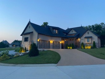 Prepare to be impressed with this exquisite custom home in the on Millwood Golf and Racquet Club in Missouri - for sale on GolfHomes.com, golf home, golf lot