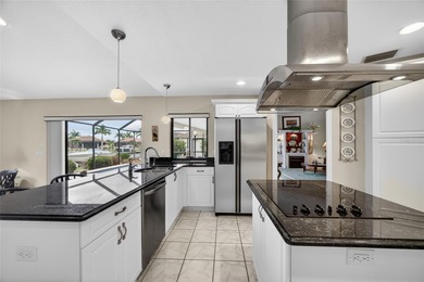 PUNTA GORDA ISLES!! QUICK SAILBOAT ACCESS FROM THIS 3 BEDROOM, 3 on Saint Andrews South Golf Club in Florida - for sale on GolfHomes.com, golf home, golf lot