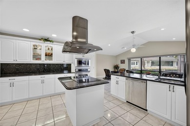 PUNTA GORDA ISLES!! QUICK SAILBOAT ACCESS FROM THIS 3 BEDROOM, 3 on Saint Andrews South Golf Club in Florida - for sale on GolfHomes.com, golf home, golf lot