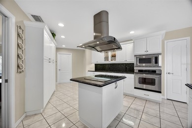 PUNTA GORDA ISLES!! QUICK SAILBOAT ACCESS FROM THIS 3 BEDROOM, 3 on Saint Andrews South Golf Club in Florida - for sale on GolfHomes.com, golf home, golf lot