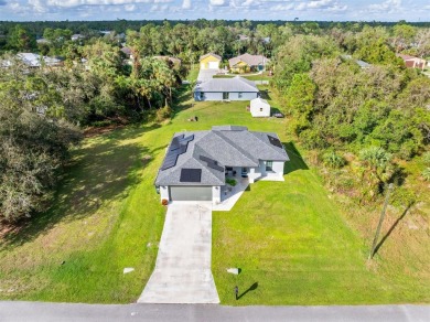 Welcome to your eco-friendly oasis in sunny North Port! This on Bobcat Trail Golf Club in Florida - for sale on GolfHomes.com, golf home, golf lot