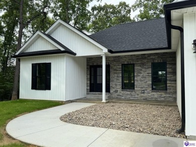 Welcome to your brand-new home in the highly sought-after gated on Doe Valley Country Club in Kentucky - for sale on GolfHomes.com, golf home, golf lot