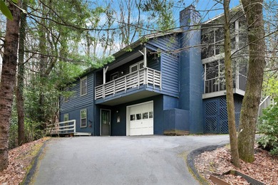 This beautifully updated 4BR, 3BA home in the sought-after on Connestee Falls Golf Club in North Carolina - for sale on GolfHomes.com, golf home, golf lot