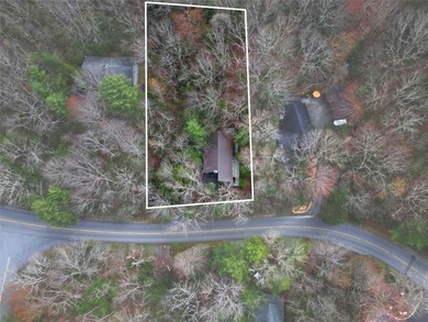 This beautifully updated 4BR, 3BA home in the sought-after on Connestee Falls Golf Club in North Carolina - for sale on GolfHomes.com, golf home, golf lot