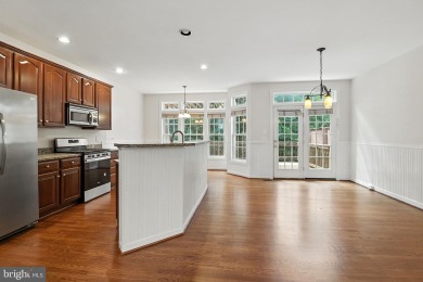 Located on one of the neighborhood's most coveted lots, this on Virginia Oaks Golf Club in Virginia - for sale on GolfHomes.com, golf home, golf lot