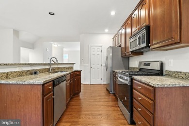 Located on one of the neighborhood's most coveted lots, this on Virginia Oaks Golf Club in Virginia - for sale on GolfHomes.com, golf home, golf lot