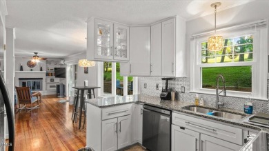 GORGEOUS + TRENDY COUNTRY CLUB HOME WITH GOLF COURSE VIEWS on Henderson Country Club in North Carolina - for sale on GolfHomes.com, golf home, golf lot