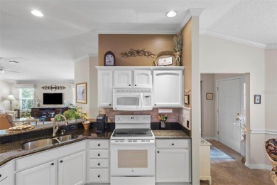 Welcome Home to this beautifully maintained Magnolia (Nueva on El Diablo Executive Golf Course in Florida - for sale on GolfHomes.com, golf home, golf lot