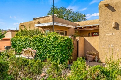 Step through a charming walled courtyard and enter a world of on Pueblo de Cochiti Golf Course in New Mexico - for sale on GolfHomes.com, golf home, golf lot