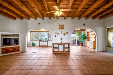 Step through a charming walled courtyard and enter a world of on Pueblo de Cochiti Golf Course in New Mexico - for sale on GolfHomes.com, golf home, golf lot