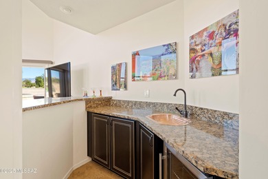 Welcome to this stunning, custom home nestled in the prestigious on Omni Tucson National Golf Resort and Spa - Sonoran in Arizona - for sale on GolfHomes.com, golf home, golf lot