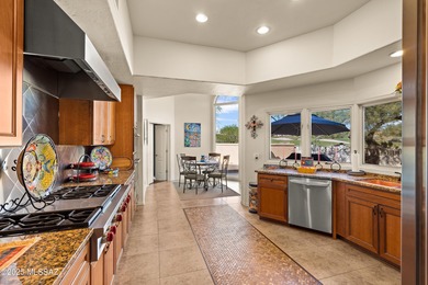 Welcome to this stunning, custom home nestled in the prestigious on Omni Tucson National Golf Resort and Spa - Sonoran in Arizona - for sale on GolfHomes.com, golf home, golf lot