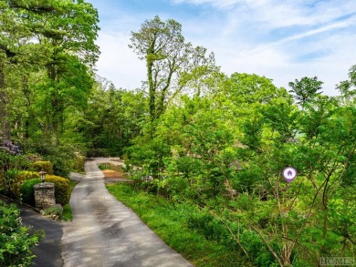 This 2.1-acre lot offers big views, and an installed septic, and on Highlands Country Club in North Carolina - for sale on GolfHomes.com, golf home, golf lot