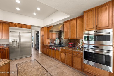 Welcome to this stunning, custom home nestled in the prestigious on Omni Tucson National Golf Resort and Spa - Sonoran in Arizona - for sale on GolfHomes.com, golf home, golf lot