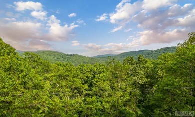 This 2.1-acre lot offers big views, and an installed septic, and on Highlands Country Club in North Carolina - for sale on GolfHomes.com, golf home, golf lot