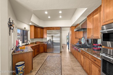 Welcome to this stunning, custom home nestled in the prestigious on Omni Tucson National Golf Resort and Spa - Sonoran in Arizona - for sale on GolfHomes.com, golf home, golf lot