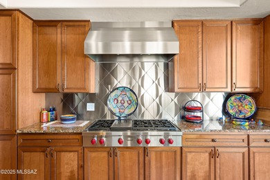 Welcome to this stunning, custom home nestled in the prestigious on Omni Tucson National Golf Resort and Spa - Sonoran in Arizona - for sale on GolfHomes.com, golf home, golf lot