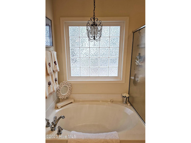 This you chance to own a well maintained home in the heart of on Sea Trail Golf Resort in North Carolina - for sale on GolfHomes.com, golf home, golf lot