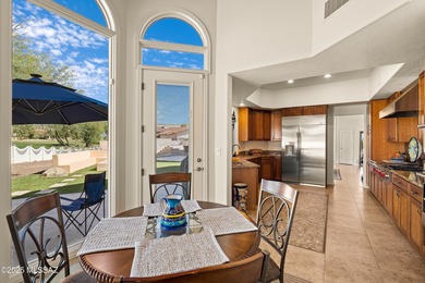 Welcome to this stunning, custom home nestled in the prestigious on Omni Tucson National Golf Resort and Spa - Sonoran in Arizona - for sale on GolfHomes.com, golf home, golf lot