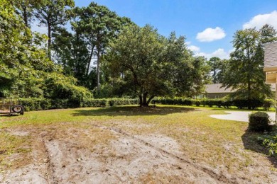 Enjoy stunning views from the 6th fairway with tranquil privacy on Harbour View Par 3 and Driving Range in South Carolina - for sale on GolfHomes.com, golf home, golf lot