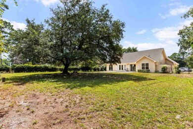 Enjoy stunning views from the 6th fairway with tranquil privacy on Harbour View Par 3 and Driving Range in South Carolina - for sale on GolfHomes.com, golf home, golf lot