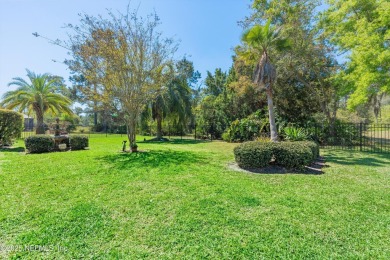 Gorgeous 3-bedroom, 2-bathroom home located on 14th Green in the on Magnolia Point Golf and Country Club in Florida - for sale on GolfHomes.com, golf home, golf lot