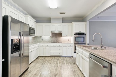 Your private retreat awaits! This exquisite 3-bedroom, 2.5-bath on The Oaks At Sherwood Golf Course in Louisiana - for sale on GolfHomes.com, golf home, golf lot