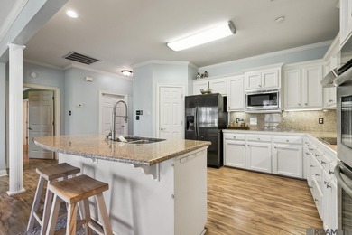 Your private retreat awaits! This exquisite 3-bedroom, 2.5-bath on The Oaks At Sherwood Golf Course in Louisiana - for sale on GolfHomes.com, golf home, golf lot