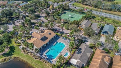 BRAND NEW ROOF! CHARMING HOME IN THE AWARD WINNING COMMUNITY on Stonegate Golf Club in Florida - for sale on GolfHomes.com, golf home, golf lot