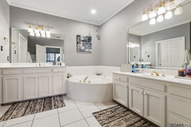 Your private retreat awaits! This exquisite 3-bedroom, 2.5-bath on The Oaks At Sherwood Golf Course in Louisiana - for sale on GolfHomes.com, golf home, golf lot