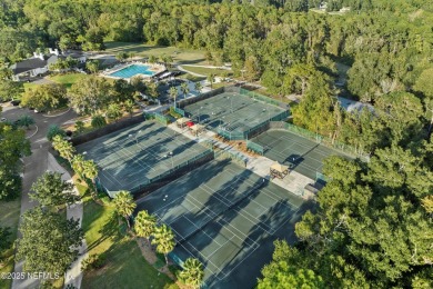 Gorgeous 3-bedroom, 2-bathroom home located on 14th Green in the on Magnolia Point Golf and Country Club in Florida - for sale on GolfHomes.com, golf home, golf lot