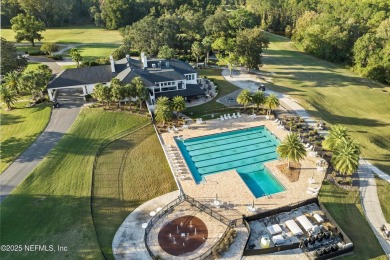 Gorgeous 3-bedroom, 2-bathroom home located on 14th Green in the on Magnolia Point Golf and Country Club in Florida - for sale on GolfHomes.com, golf home, golf lot