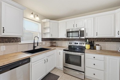 This adorable home in North Richland Hills is the perfect size on Diamond Oaks Golf and Country Club in Texas - for sale on GolfHomes.com, golf home, golf lot