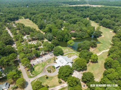 Discover the perfect blend of privacy and convenience with this on Ladys Island Country Club in South Carolina - for sale on GolfHomes.com, golf home, golf lot