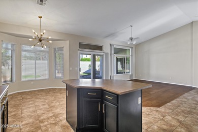 Popular Augusta model with 2 master suites. Located in the on Tuscany Falls At Pebble Creek in Arizona - for sale on GolfHomes.com, golf home, golf lot