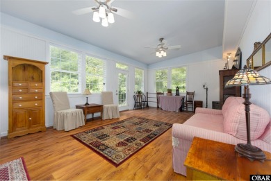 This low country home welcomes you!  The covered front porch on Holly Ridge Golf Course in North Carolina - for sale on GolfHomes.com, golf home, golf lot