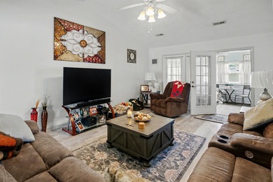 Welcome home to this well-maintained three-bedroom, two-bathroom on The Hackler Course at Coastal Carolina University in South Carolina - for sale on GolfHomes.com, golf home, golf lot