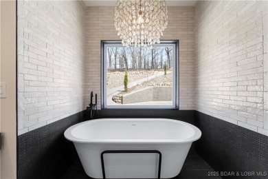 MOTIVATED SELLER! This stunning 5,500 sq ft home offers a blend on The Club At Porto Cima in Missouri - for sale on GolfHomes.com, golf home, golf lot