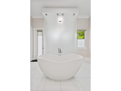 This exquisite residence, designed and built by the prestigious on Medalist Golf Club in Florida - for sale on GolfHomes.com, golf home, golf lot