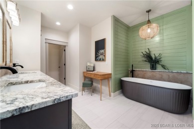 MOTIVATED SELLER! This stunning 5,500 sq ft home offers a blend on The Club At Porto Cima in Missouri - for sale on GolfHomes.com, golf home, golf lot