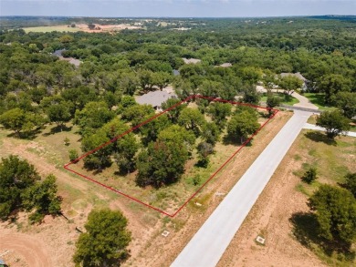 Discover the perfect setting for your dream home on this on Pecan Plantation Country Club in Texas - for sale on GolfHomes.com, golf home, golf lot