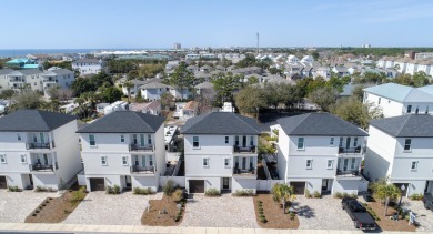 Embrace coastal living in this 4-bed, 4.5-bath, 3-story retreat on Seascape Golf Course in Florida - for sale on GolfHomes.com, golf home, golf lot