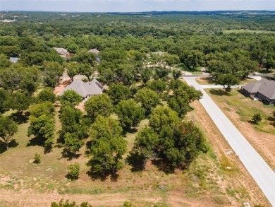 Discover the perfect setting for your dream home on this on Pecan Plantation Country Club in Texas - for sale on GolfHomes.com, golf home, golf lot