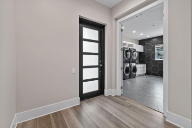 This exquisite residence, designed and built by the prestigious on Medalist Golf Club in Florida - for sale on GolfHomes.com, golf home, golf lot