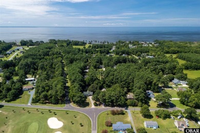 This low country home welcomes you!  The covered front porch on Holly Ridge Golf Course in North Carolina - for sale on GolfHomes.com, golf home, golf lot